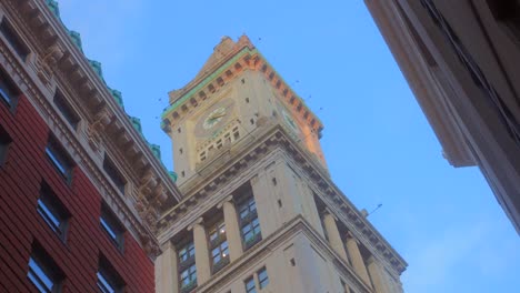 skyscraper of custom house tower against blue sky in boston, massachusetts, usa