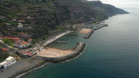 unnatural sandy beach on coastline of madeira island, part of portugal