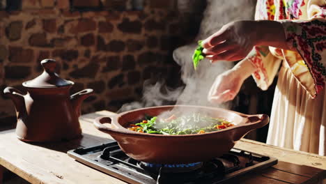 woman preparing a delicious tagine dish