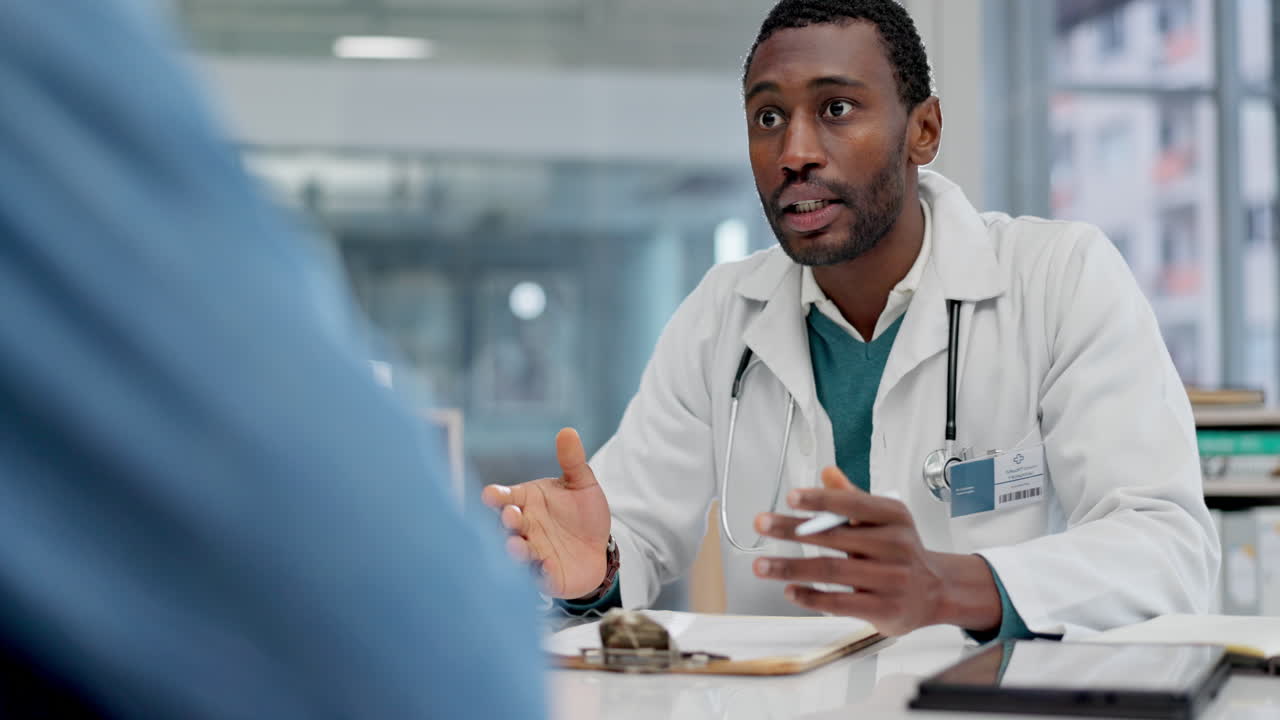 Black man, doctor and consulting patient