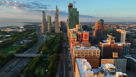 golden hour morning sunrise over chicago skyline along south michigan avenue