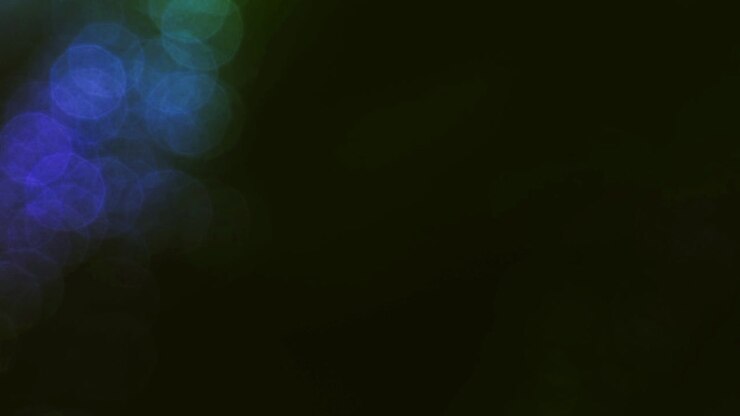 Abstract Green Bokeh Light Fading to Black
