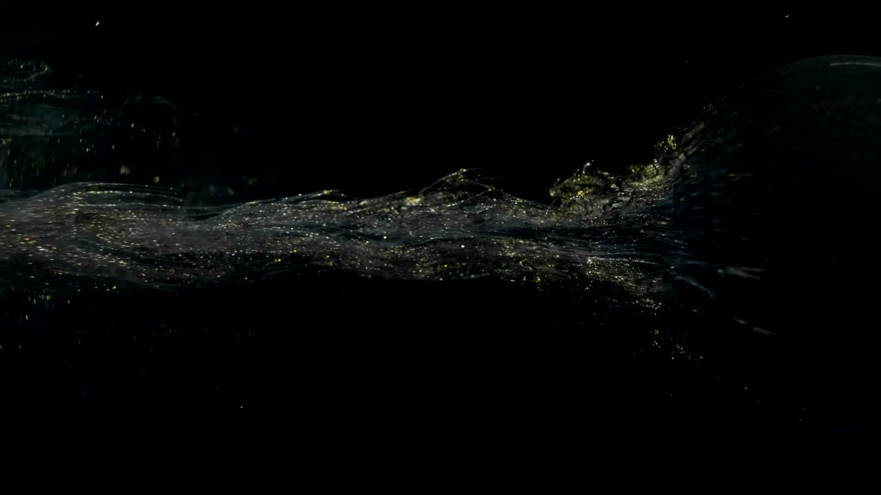 다채로운 잉크 페인트가 천천히 공에서 흘러나옵니다.