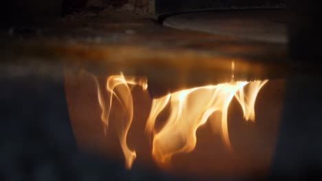 fire in a wood-burning stove underwater