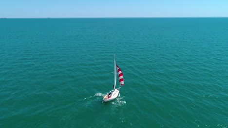 aerial view of white boat in the sea. modern yacht holding in the ocean