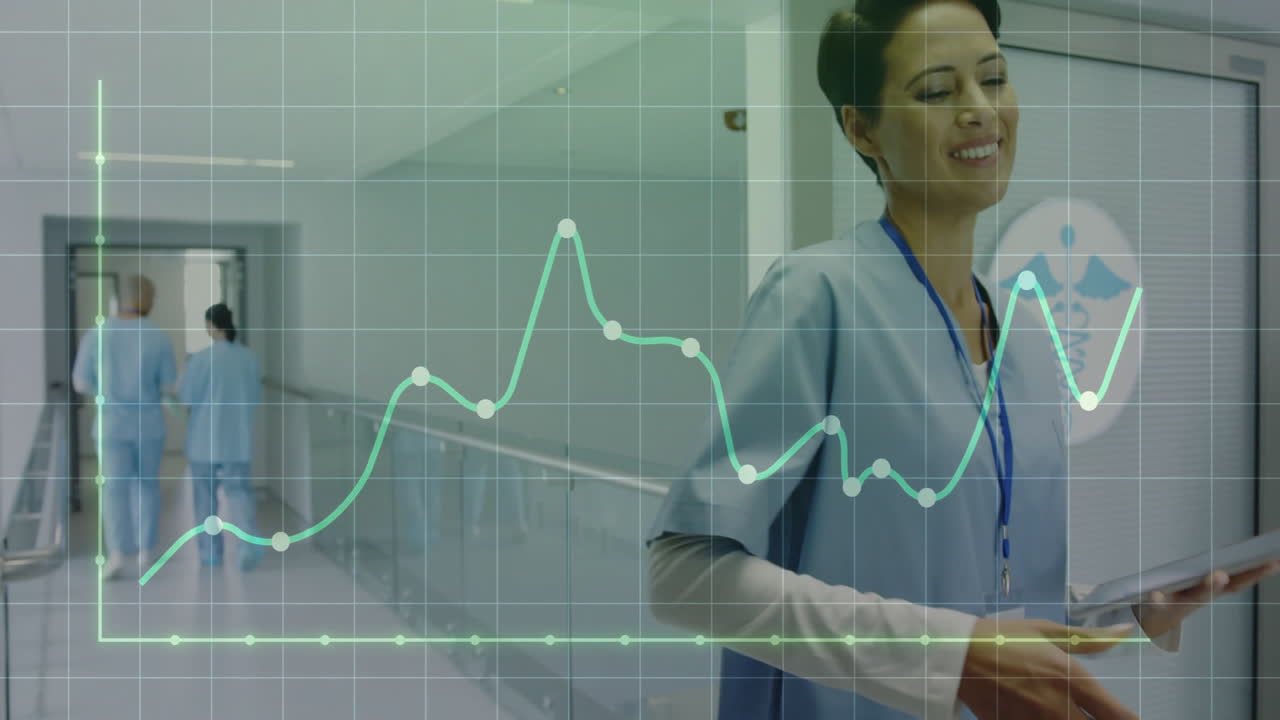 In hospital, healthcare professional using tablet with medical data animation overlay