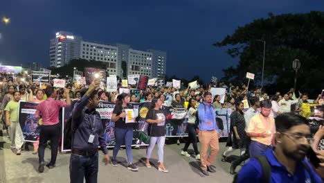 employees, workers and locals demanding justice for rg kar rape case in kolkata, india. night protest.
