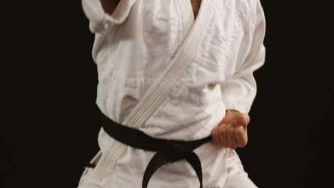 man practicing karate