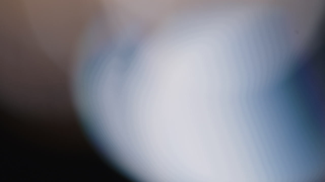 Multicolored light leaks 4k footage on black background stylizing video transitions bokeh effect