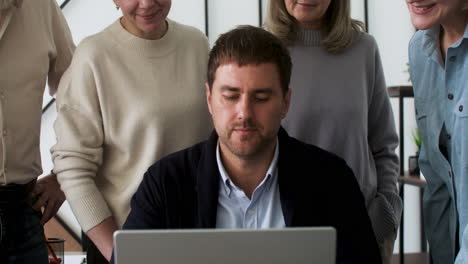 male teacher and students in classroom