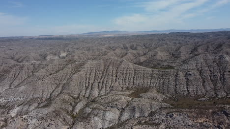 aerial view of a rugged, arid landscape