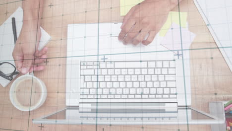Animation of data processing over caucasian businessman using laptop