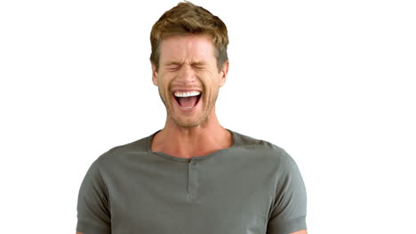 Handsome-man-laughing-on-white-background