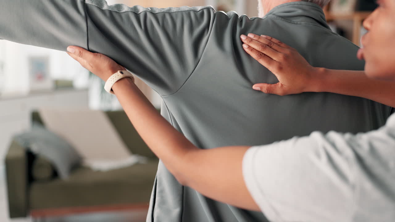 Physical therapist treating senior patient