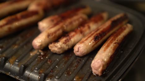 Homemade-Sausages-Being-Cooked-On-a-Grill