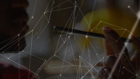 Animation of connected dots with lines over african american man talking on speaker of cellphone