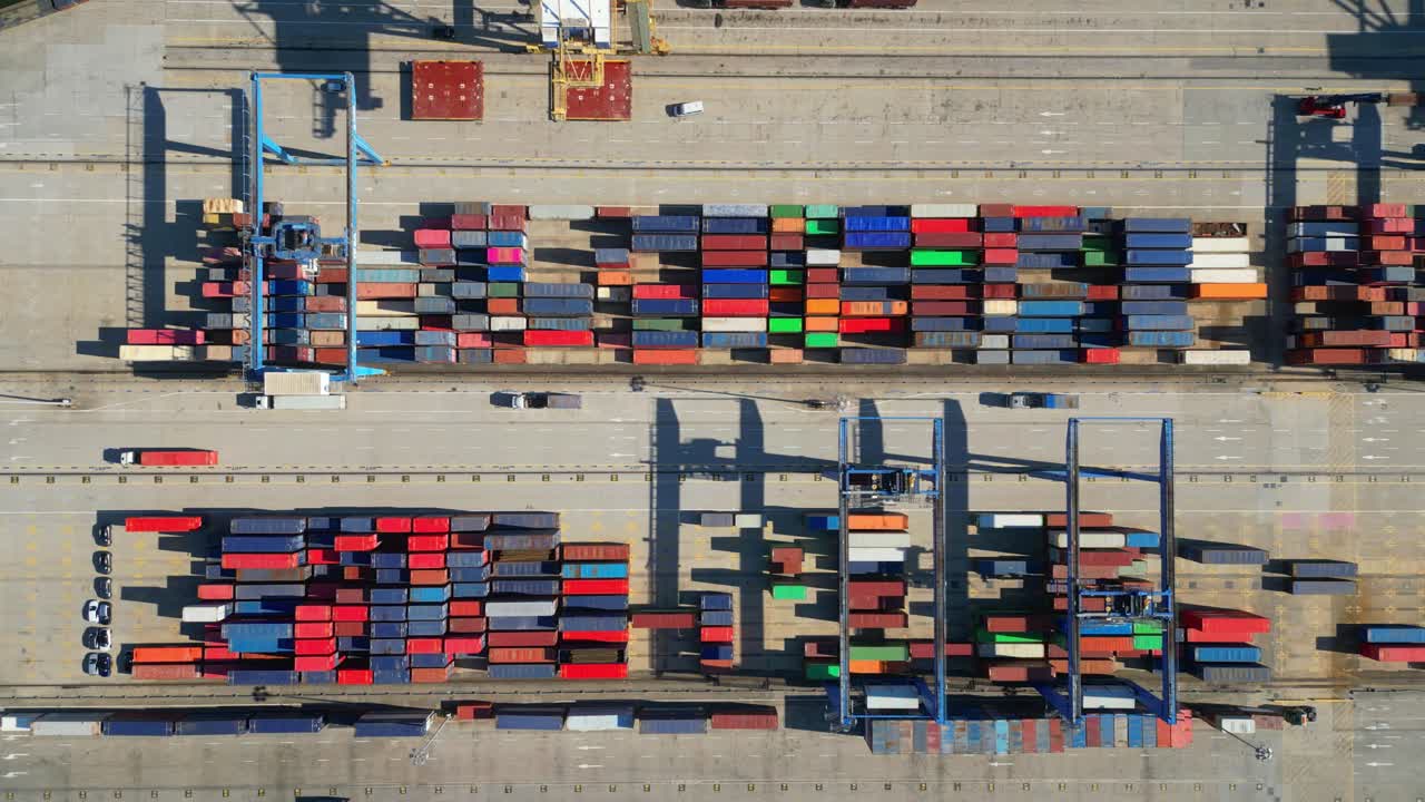 Aerial view of a truck driving among colorful containers at a container terminal in Lisbon,Portugal