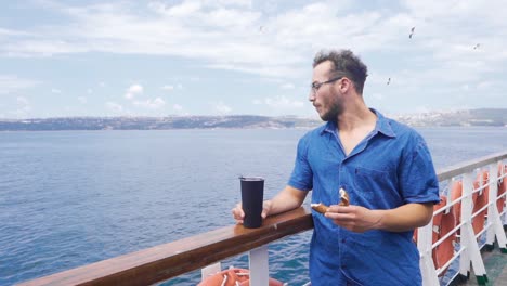 The-young-man-is-on-the-ferry.-In-slow-motion.