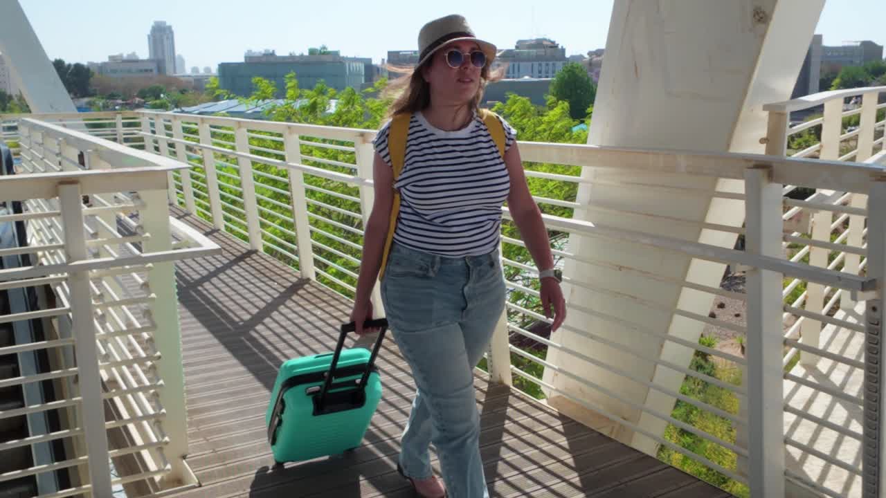 Woman Traveler Walking on a Bridge