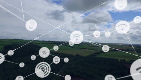 network of connections and data processing animation over rural landscape