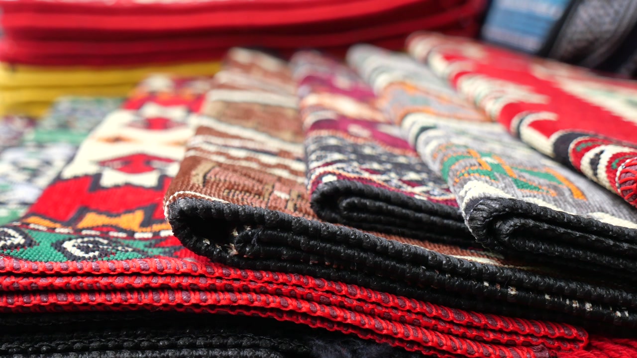 Close-Up of Stacked Traditional Patterned Rugs