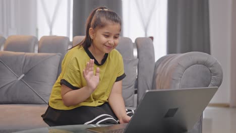 Indian-kid-girl-attending-online-or-virtual-classes