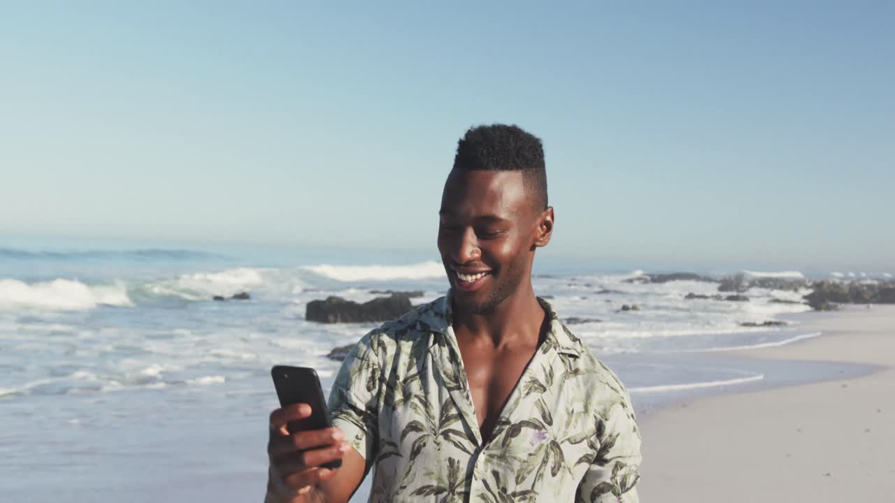 African American taking a selfie seaside