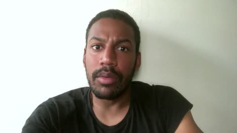 african american man gets good news video call