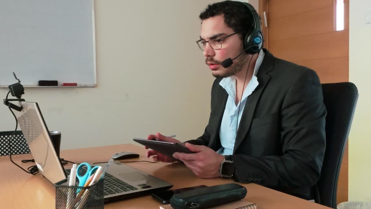 Man in Virtual Classroom: Tablet Note-Taking