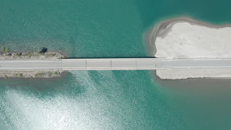 aerial - bridge on traful lake, patagonia, río negro, argentina, top down lowering