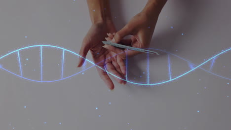 holding medication, hands over glowing dna strand animation, focusing on science