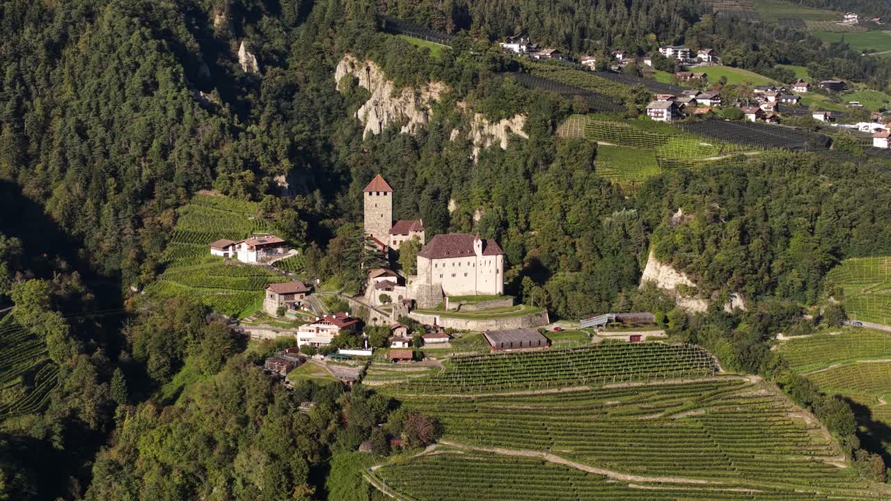 Tyrol Castle Schloss Tirol or Castel Tirolo, in South Tyrol, Italy, aerial video