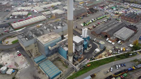 Nottingham-Incinerator,-waste-recycling-Nottingham-City-,-UK-smoke-drifts-across-shot-,aerial-drone-4K-footage-Waste-Recycling-Group-Ltd