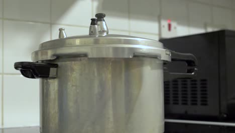 steam coming from mechanical rice cooker