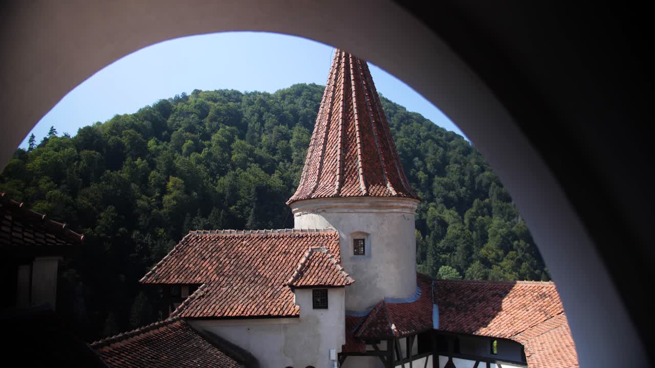 Appreciation of the peaked roofs of Bran Castle in Romania.