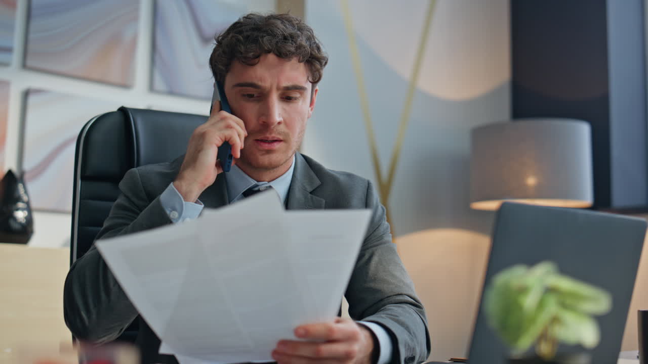 Emotional boss yelling smartphone office closeup. Furious business man calling