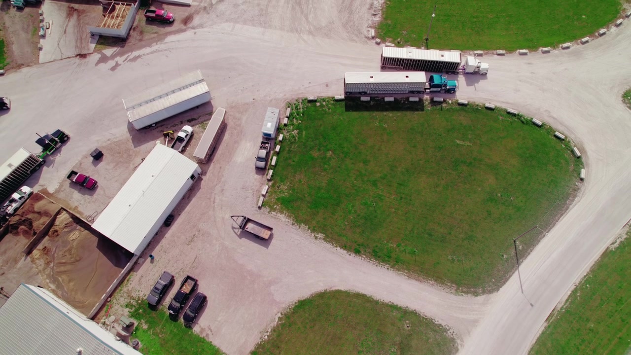 Top view of Semi truck with livestock trailer in Iowa state, USA.