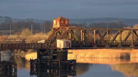 waterford the red iron bridge disused railway bridge near waterford on a cold winter afternoon at golden hour