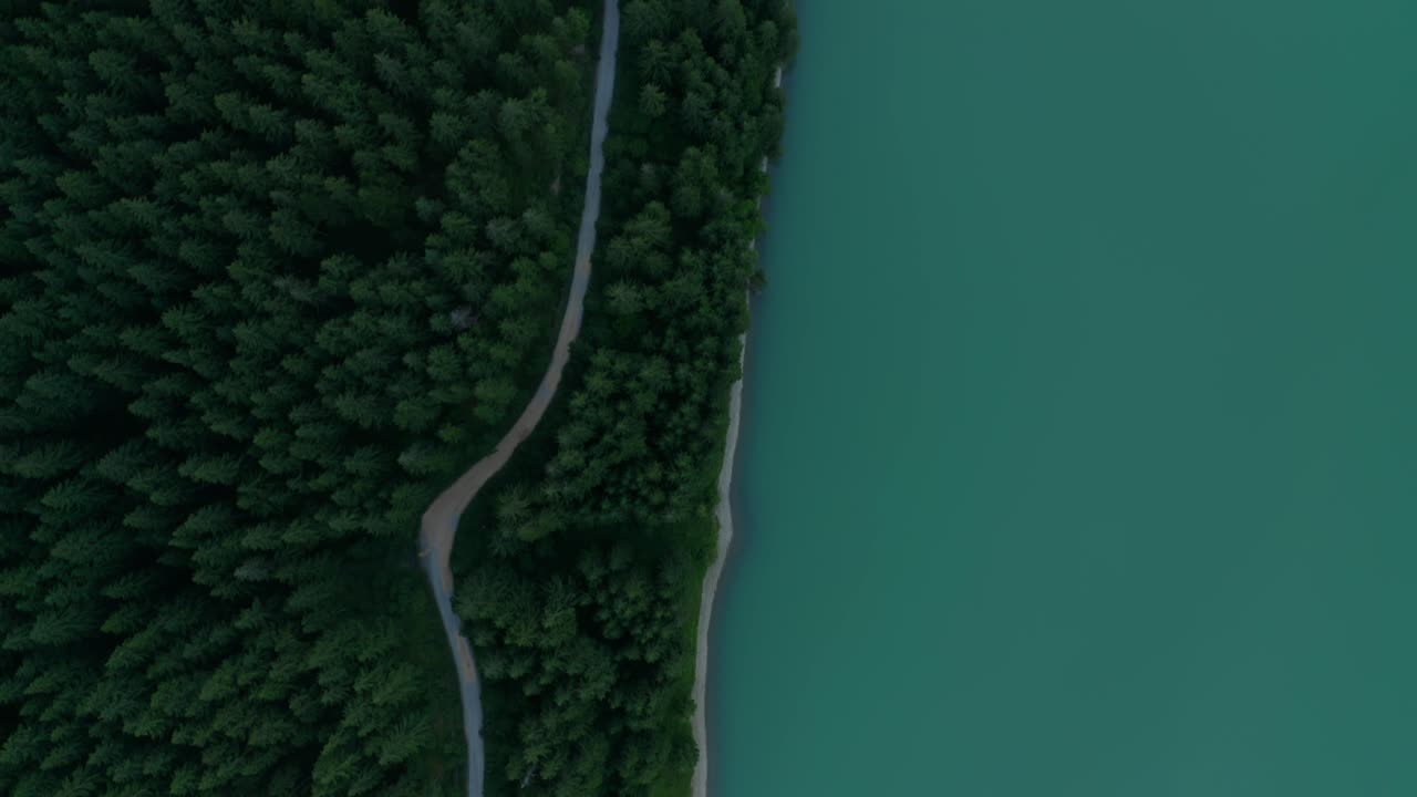 Turquoise Water And Green Woods At Frumoasa Dam In Harghita County, Romania. aerial