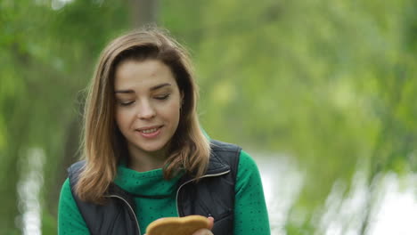 woman with cookies. young woman playing with cookies in nature