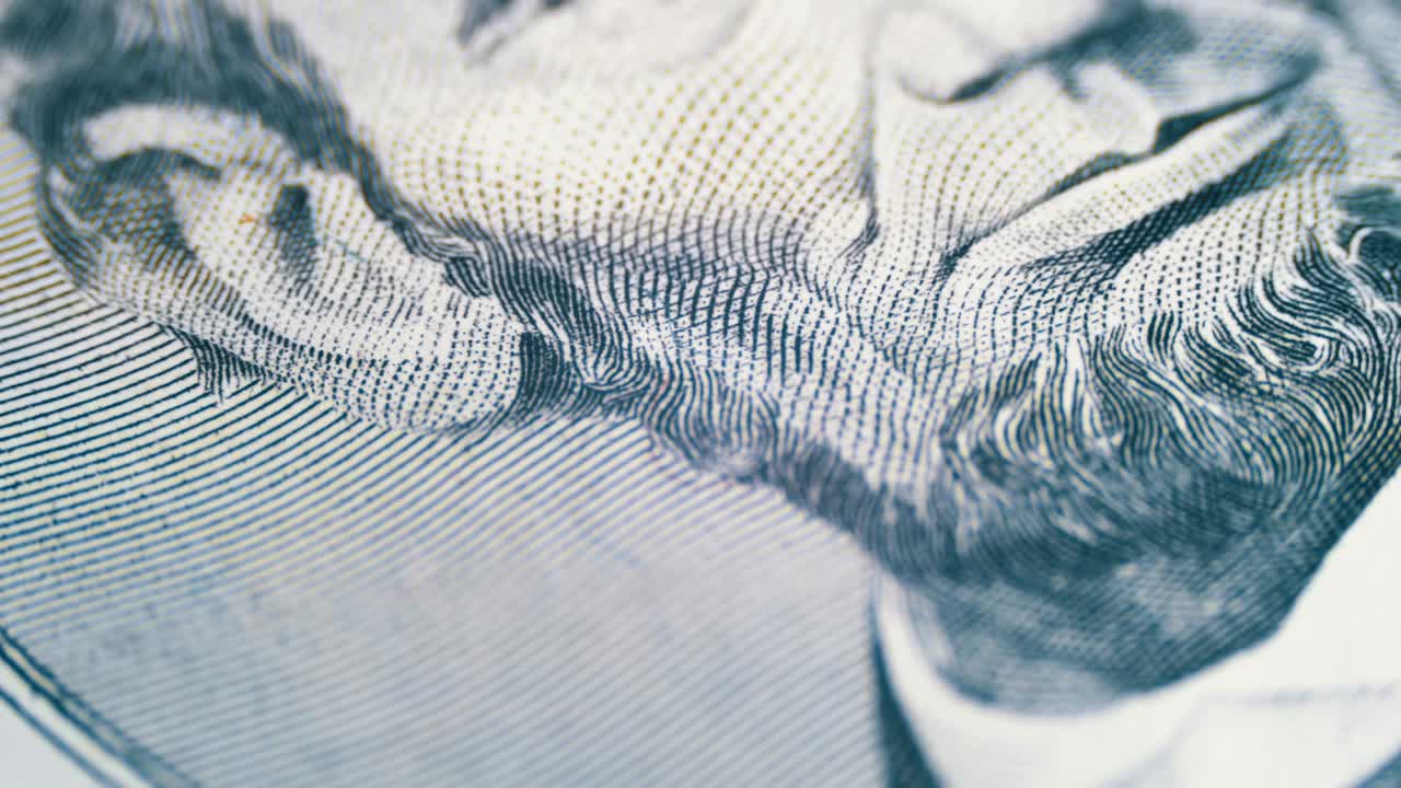 Volto di Abraham Lincoln in rotazione lenta su una banconota da cinque dollari