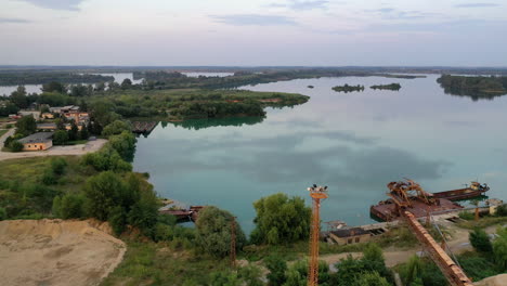 sand quarry lake, to divide the dredged material into different fractions at sand extraction, drone aerial