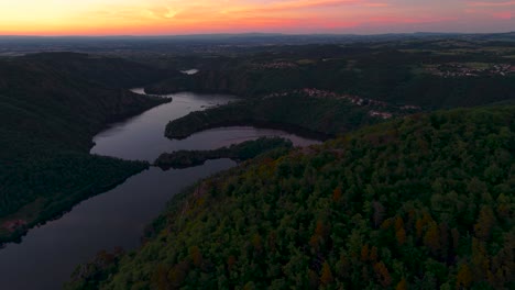 aerial shot over the gorges de la loire at sunset with the plateau de la danse in the foreground, loire departement, auvergne rhone alpes region, france