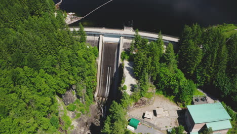 Aerial-view-of-the-Cleveland-Dam-at-the-head-of-the-Capilano-River-in-North-Vancouver,-British-Columbia