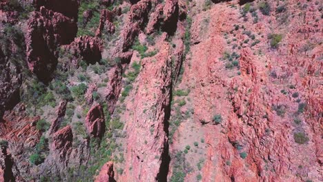 mt sonder - central australia. top down aerial flyover - tracking forwards - cliffs, ravines and gorges. filmed on dji mavic pro.