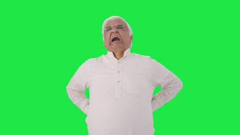 Sick-Indian-old-man-suffering-from-back-pain-Green-screen