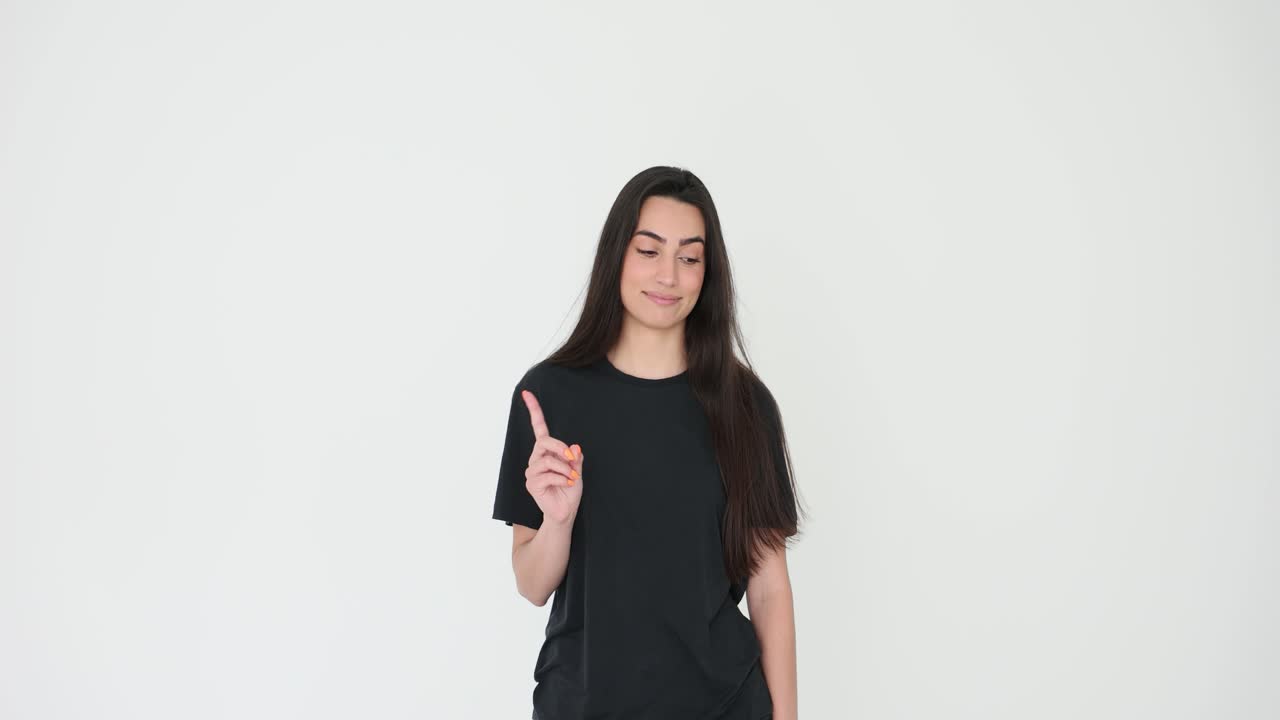 Woman pointing with index finger