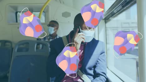 animation of face masks over african american man in face mask in bus with smartphone