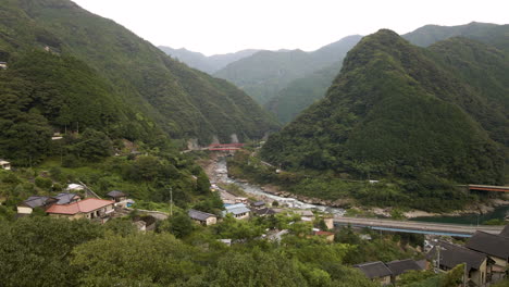 aerial shot over rural japanese mountain town in kochi prefecture on the island of shikoku