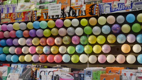 balloon dart game at a market